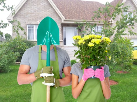 Professional gardener reviewing service terms before starting work