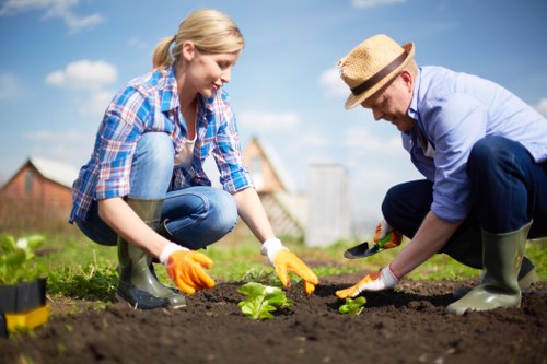 Gardener applying safety measures during outdoor work
